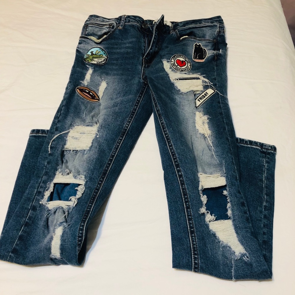 Limited edition distressed patched  jeans size 26